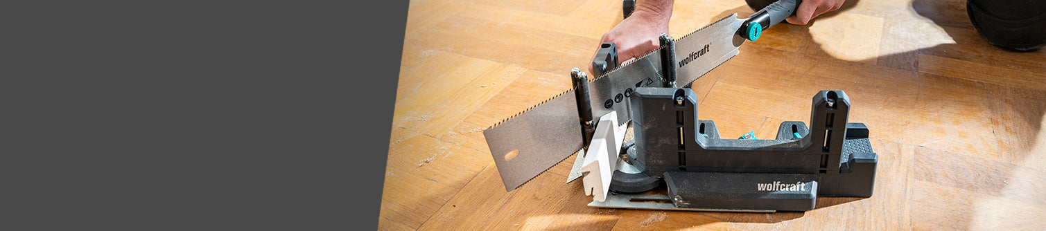 Knife sharpener being used on a wooden surface